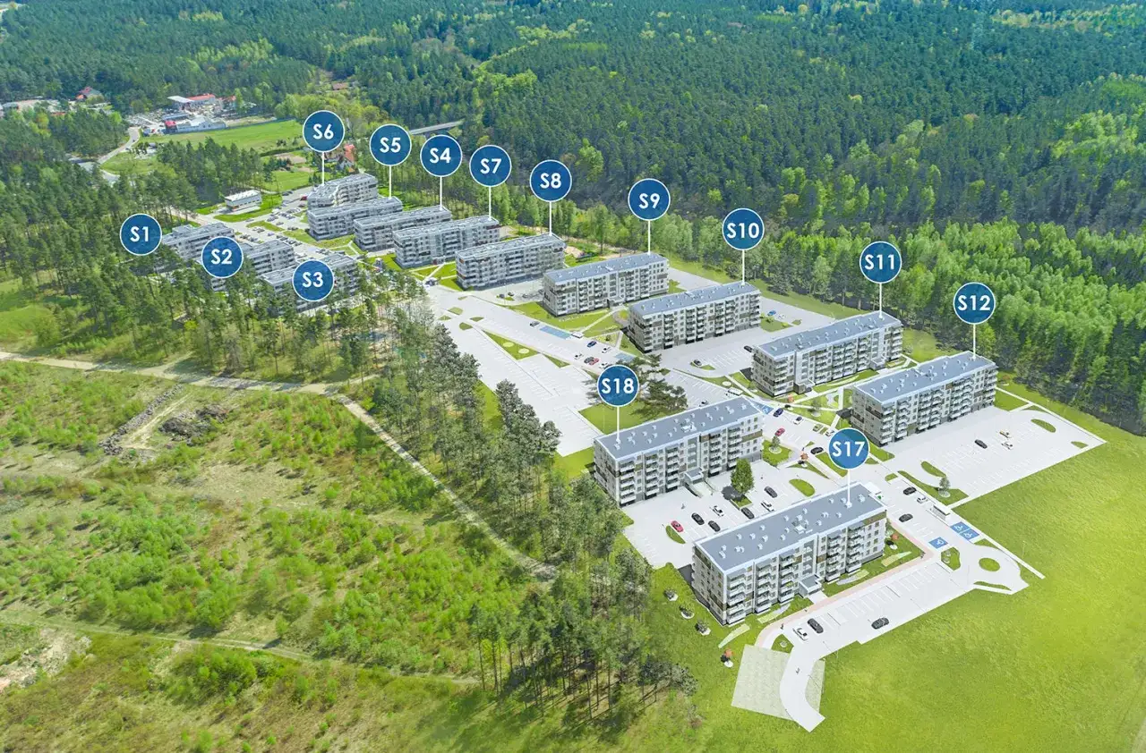 Osiedle Sterowców: widać 18 budynków mieszkalnych, otoczonych zielenią.
